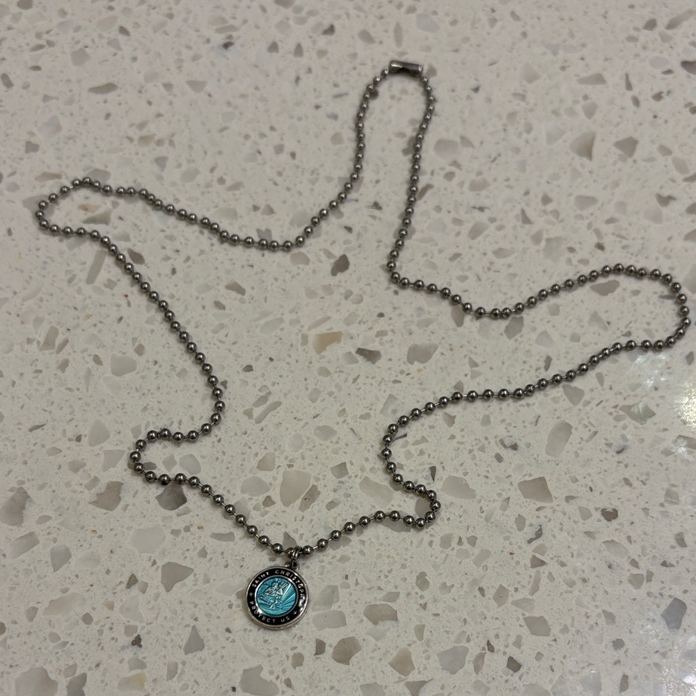 Elegant St. Christopher protect us pendant in turquoise with black outline